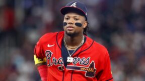 Ronald Acuna Jr in a red Braves uniform