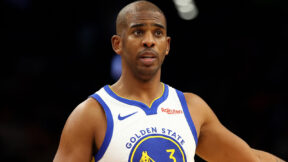 Chris Paul looking on