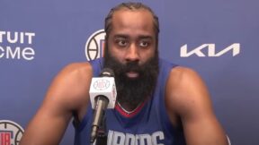 James Harden talks with the media