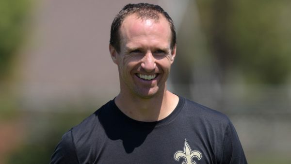 Drew Brees smiling at practice