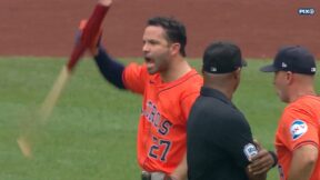 Jose Altuve holds up his bat