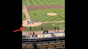 Vikings QB JJ McCarthy throws the first pitch for a Twins-Royals game