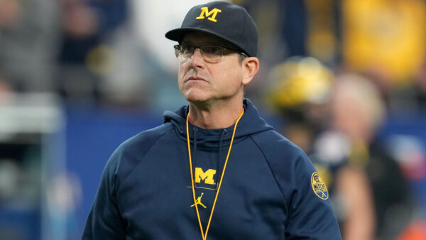 Michigan coach Jim Harbaugh looking on