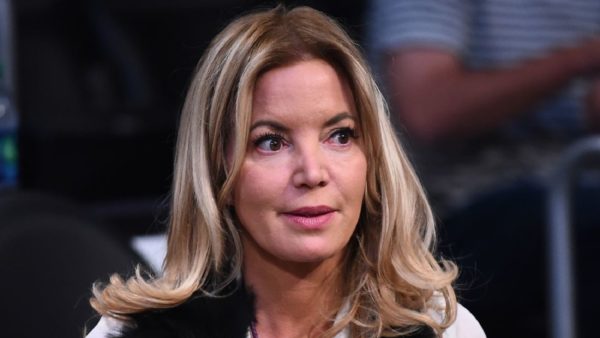 Jeanie Buss looking on