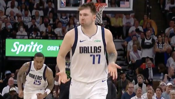 Luka Doncic shrugs after making a shot