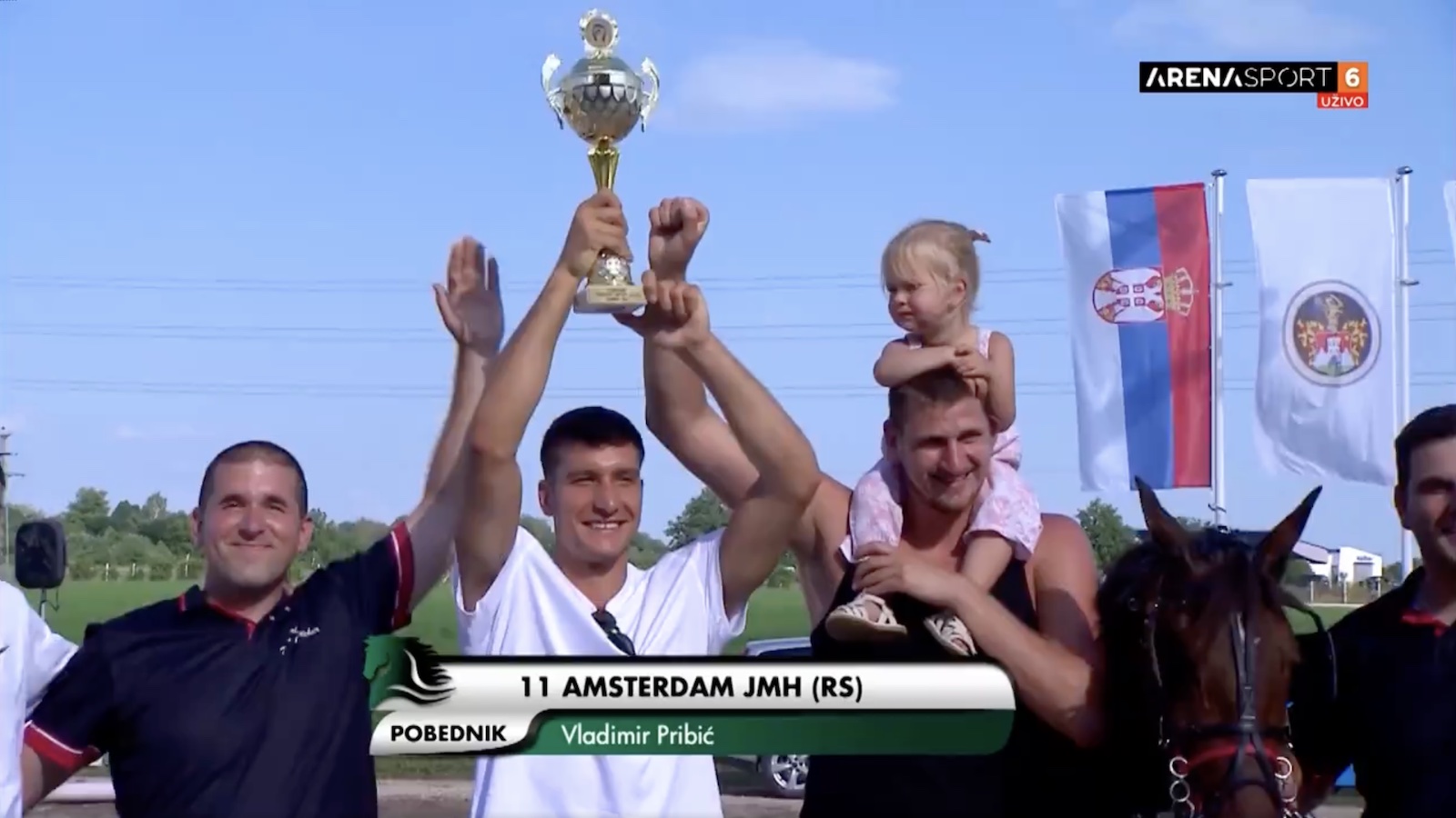 Nikola Jokic celebrating with Bogdan Bogdanovic after winning a horse race