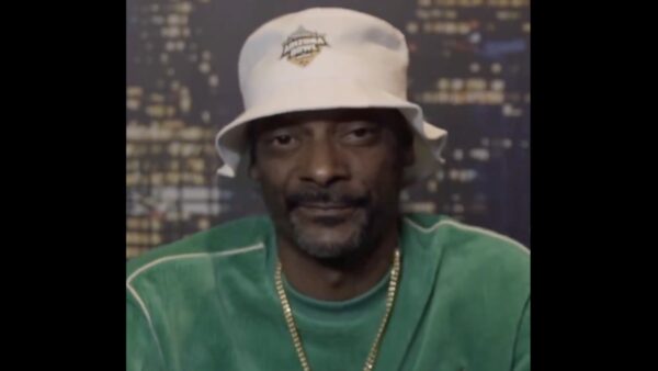 Snoop Dogg wearing an Arizona Bowl hat