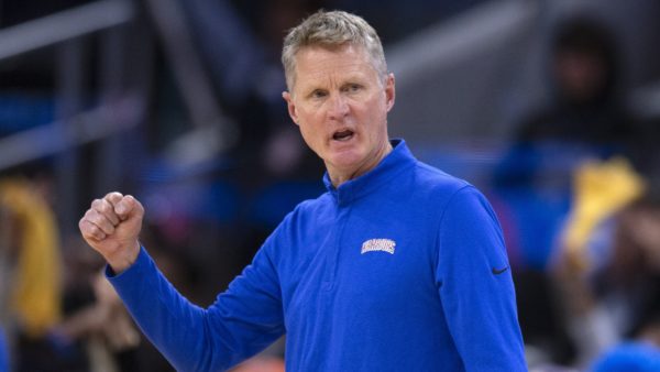 Warriors coach Steve Kerr in a blue warmup jacket