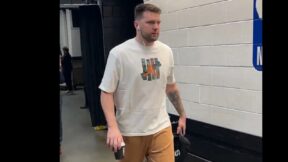 Luka Doncic holding a bag