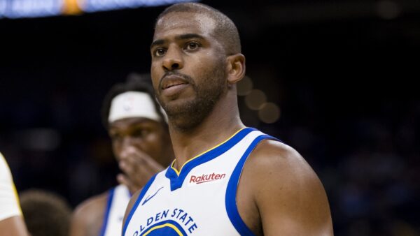 Chris Paul looks on