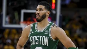 Jayson Tatum in a Celtics jersey