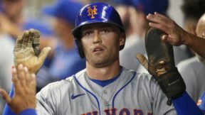 Brandon Nimmo receiving high fives