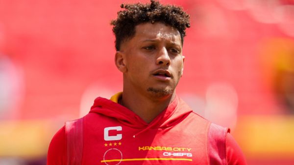 Patrick Mahomes during warmups wearing a Chiefs hoodie