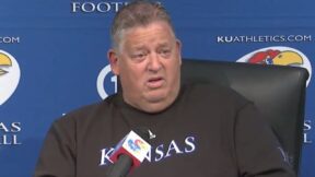 Charlie Weis speaking to the media