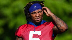 Colts QB Anthony Richardson fixing his headband