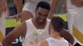 Former Heat teammates Chris Bosh and Goran Dragic chatting on the court