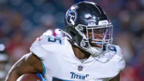 Hassan Haskins holds a ball