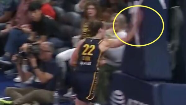 Caitlin Clark slaps a stanchion in frustration