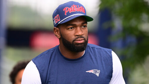 Jacoby Brissett wearing Patriots gear