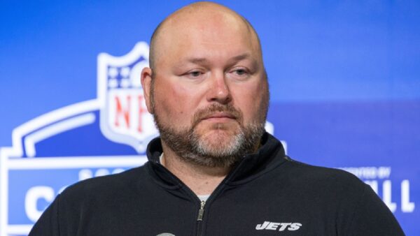 Joe Douglas speaking with reporters