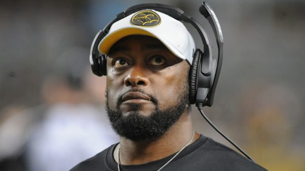 Steelers coach Mike Tomlin with a headset on