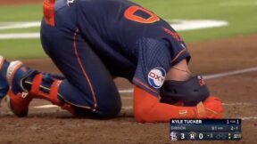 Astros star Kyle Tucker on the ground with a shin injury