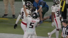 Falcons wide receiver Drake London celebrating after scoring a touchdown against the Eagles