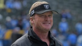 Jon Gruden with a visor on