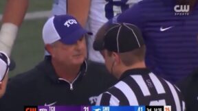 Sonny Dykes argues with an official