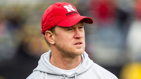 Scott Frost in a Nebraska cap