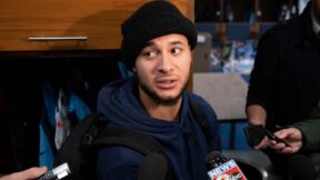 Caleb Farley interviewed in the locker room